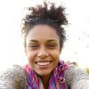 young-woman-smiling-and-talking-a-selfie-PPNZP4D-rb7ua9nuoxkz1xtl4jyol4n3ezb0c3iwrwocecvsa0